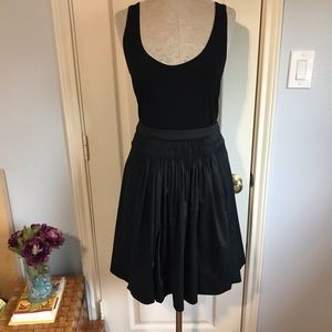 Elie Tahari black skirt pleated in front panel.